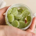 Woman using gummies