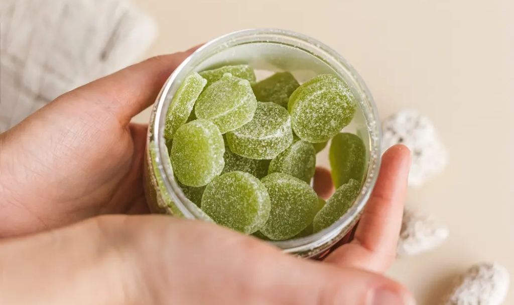 Woman using gummies